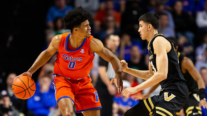 Feb 24, 2024; Gainesville, Florida, USA; Florida Gators guard Zyon Pullin (0) dribbles the ball at