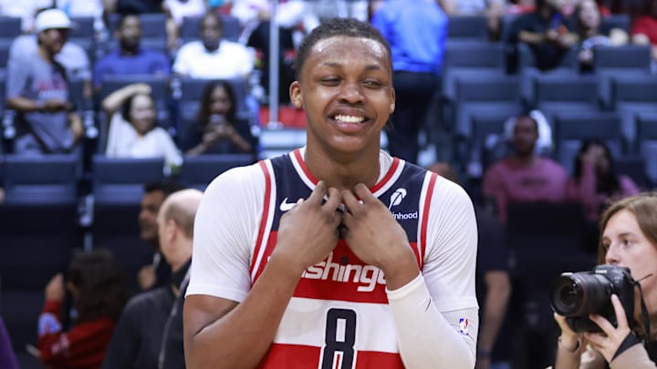 Apr 13, 2025; Miami, Florida, USA; Washington Wizards guard Bub Carrington (8) reacts after the Wizards win against the Miami Heat at Kaseya Center. Mandatory Credit: Rhona Wise-Imagn Images