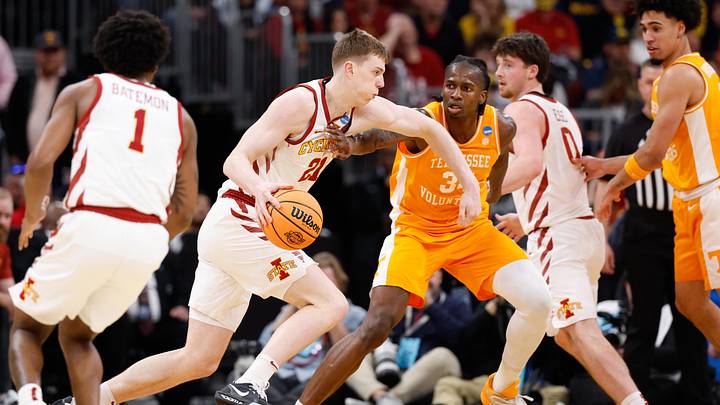 Mar 27, 2026; Chicago, IL, USA; Iowa State Cyclones forward Dominykas Pleta (21) drives the ball against Tennessee Volunteers forward Felix Okpara (34) in the second half during a Sweet Sixteen game of the Midwest Regional of the men's 2026 NCAA Tournament at United Center.