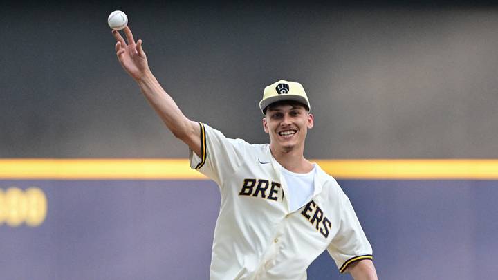 Aug 5, 2023; Milwaukee, Wisconsin, USA; Miami Heat guard Tyler Herro throws a ceremonial first pitch before game between Milwaukee Brewers and Pittsburgh Pirates at American Family Field. Herro is a Wisconsin native. Mandatory Credit: Benny Sieu-USA TODAY Sports