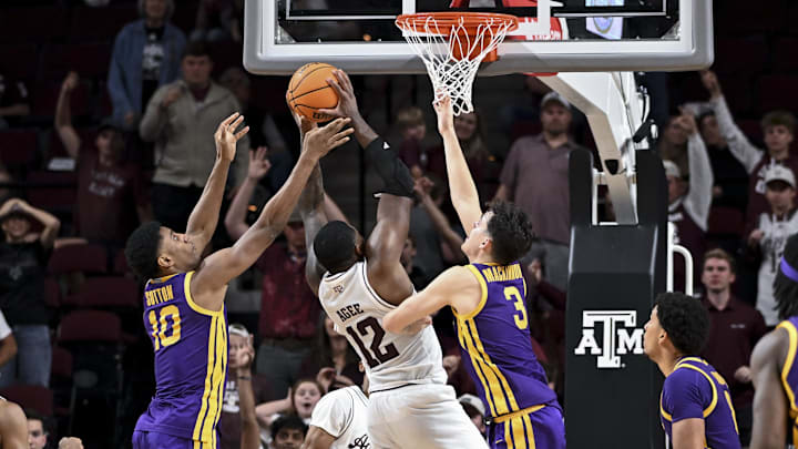 Jan 3, 2026; College Station, Texas, USA; Texas A&M Aggies forward Rashaun Agee (12) is fouled by Louisiana State Tigers guard Max MacKinnon (3) during the second half at Reed Arena. Mandatory Credit: Maria Lysaker-Imagn Images 