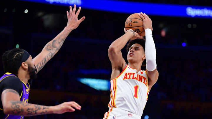 Jan 3, 2025; Los Angeles, California, USA; Atlanta Hawks forward Jalen Johnson (1) shoots against Los Angeles Lakers forward Anthony Davis (3) during the first half at Crypto.com Arena. Mandatory Credit: Gary A. Vasquez-Imagn Images Jan 3, 2025; Los Angeles, California, USA; Atlanta Hawks forward Jalen Johnson (1) shoots against Los Angeles Lakers forward Anthony Davis (3) during the first half at Crypto.com Arena. Mandatory Credit: Gary A. Vasquez-Imagn Images
