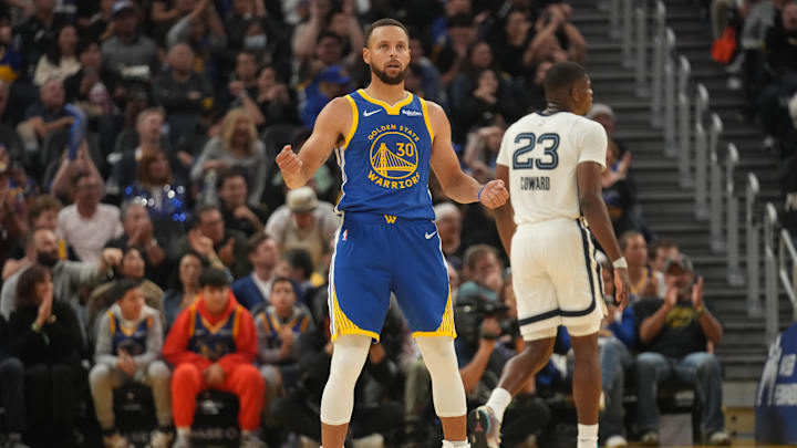 Oct 27, 2025; San Francisco, California, USA; Golden State Warriors guard Stephen Curry (30) reacts after the Warriors made a basket while being fouled against the Memphis Grizzlies in the second quarter at the Chase Center. Mandatory Credit: Cary Edmondson-Imagn Images