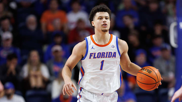 Dec 21, 2024; Gainesville, Florida, USA; Florida Gators guard Walter Clayton Jr. (1) dribbles the ball against the North Florida Ospreys during the second half at Exactech Arena at the Stephen C. O'Connell Center. Mandatory Credit: Matt Pendleton-Imagn Images
