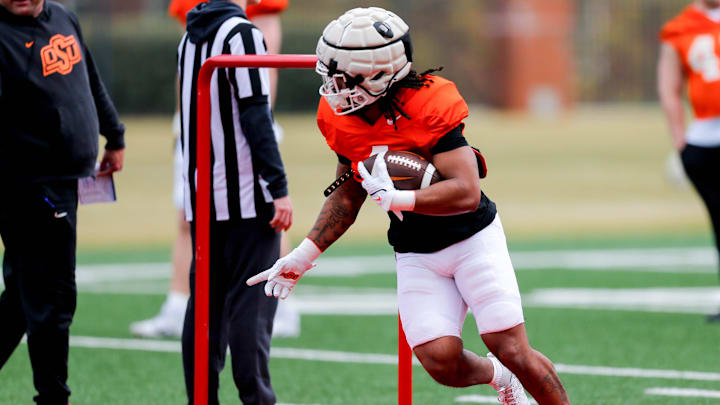 AJ Green (4) runs drills during a Oklahoma State football practice, in Stillwater, Okla., on Tuesday, April 2, 2024.