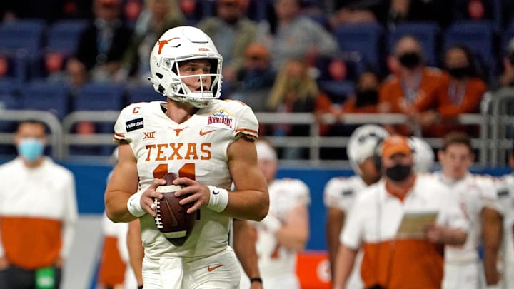 Dec 29, 2020; San Antonio, TX, USA; Texas Longhorns quarterback Sam Ehlinger (11) throws a pass against the Colorado Buffaloes during the first half at Alamodome. Mandatory Credit: Kirby Lee-Imagn Images Dec 29, 2020; San Antonio, TX, USA; Texas Longhorns quarterback Sam Ehlinger (11) throws a pass against the Colorado Buffaloes during the first half at Alamodome. Mandatory Credit: Kirby Lee-Imagn Images
