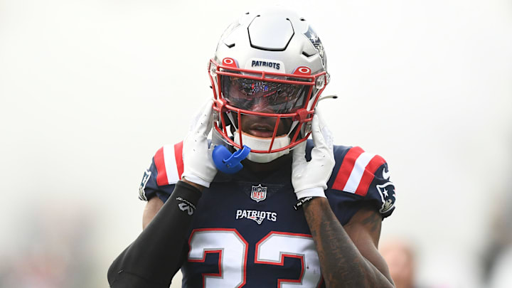Aug 11, 2022; Foxborough, Massachusetts, USA; New England Patriots cornerback Joejuan Williams (33) walks onto the field before a preseason game against the New York Giants at Gillette Stadium. Mandatory Credit: Brian Fluharty-Imagn Images