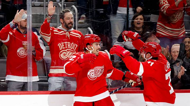 Apr 7, 2026; Detroit, Michigan, USA;  Detroit Red Wings defenseman Justin Faulk (72) receives congratulations from Detroit Red Wings center Dylan Larkin (71) after scoring in the second period against the Columbus Blue Jackets at Little Caesars Arena. Mandatory Credit: Rick Osentoski-Imagn Images