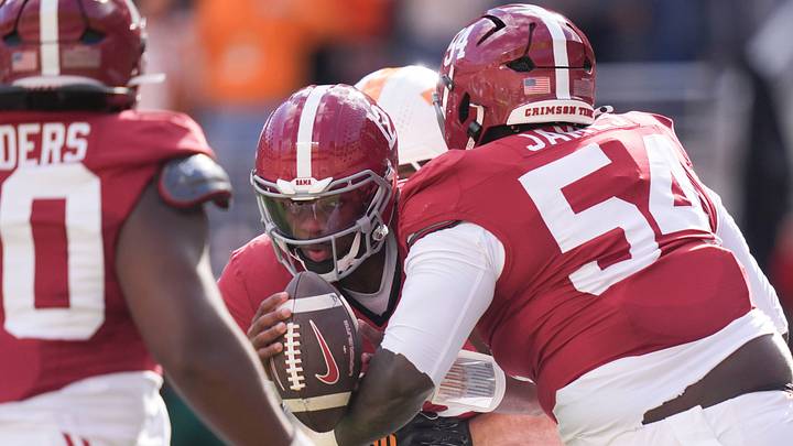 Tennessee linebacker Jeremiah Telander (22) sacks Alabama quarterback Keelon Russell (12) during a game between Tennessee and Alabama in Neyland Stadium in Knoxville, Tenn., Oct. 17, 2026.