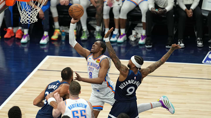 May 26, 2025; Minneapolis, Minnesota, USA; Oklahoma City Thunder forward Jalen Williams (8) shoots the ball over Minnesota Timberwolves guard Nickeil Alexander-Walker (9) in the second half during Game 4 of the Western Conference Finals at Target Center. Mandatory Credit: Jesse Johnson-Imagn Images