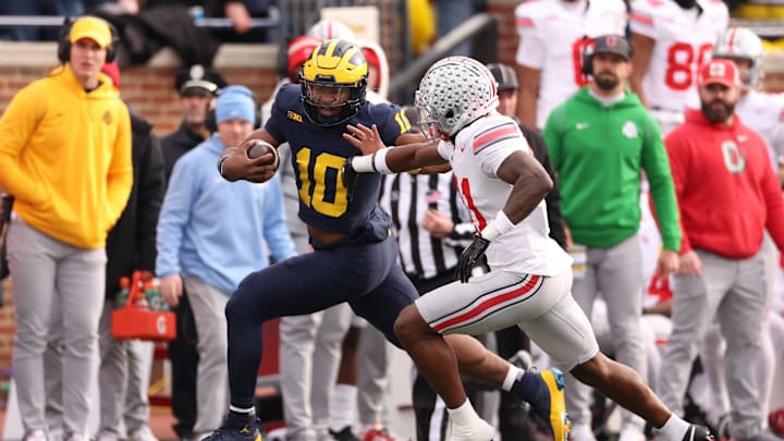 Alex Orgi runs the ball vs Ohio State in 2023.