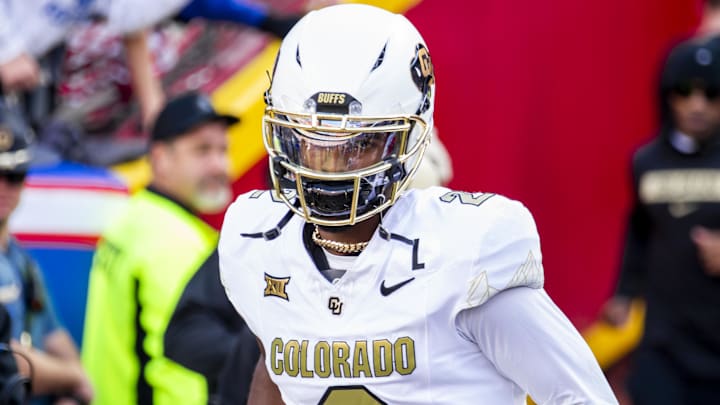 Nov 23, 2024; Kansas City, Missouri, USA;  Colorado quarterback Shedeur Sanders (2) jogs onto the field during the game against the Kansas Jayhawks at GEHA Field at Arrowhead Stadium. Mandatory Credit: Nick Tre. Smith-Imagn Images