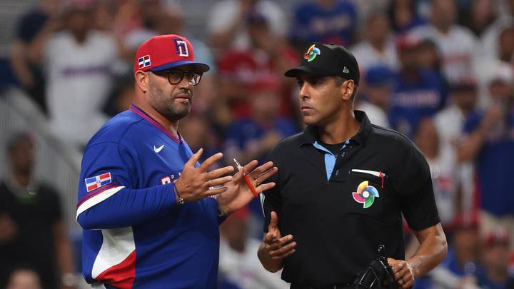 Mar 11, 2026; Miami, FL, United States; Dominican Republic manager Albert Pujols (5) speaks to home plate umpire Gabe Morales during the ninth inning against Venezuela at loanDepot Park. Mandatory Credit: Sam Navarro-Imagn Images
