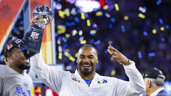 Feb 13, 2022; Inglewood, CA, USA; Los Angeles Rams wide receiver Robert Woods celebrates with the Vince Lombardi Trophy after defeating the Cincinnati Bengals during Super Bowl LVI at SoFi Stadium. Mandatory Credit: Mark J. Rebilas-Imagn Images