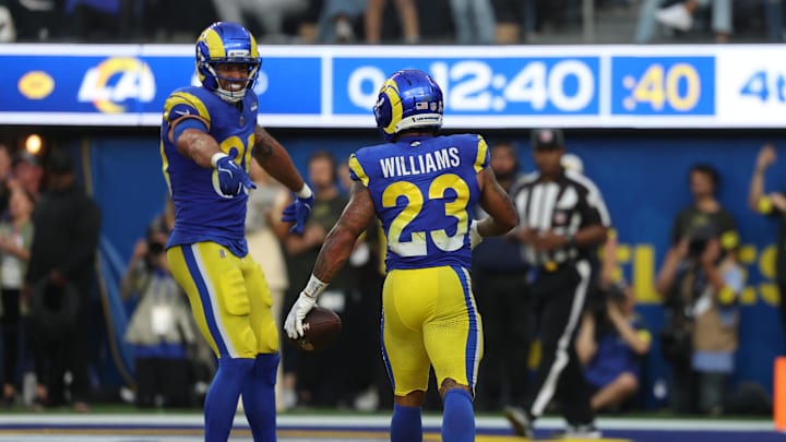Nov 2, 2025; Inglewood, California, USA; Los Angeles Rams running back Kyren Williams (23) celebrates his touchdown run with Los Angeles Rams tight end Tyler Higbee (89) during the second half at SoFi Stadium. Mandatory Credit: Kiyoshi Mio-Imagn Images