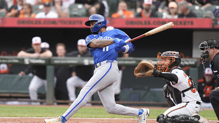 Maikel Garcia hits one of the Royals' seven home runs against the Orioles Sunday.