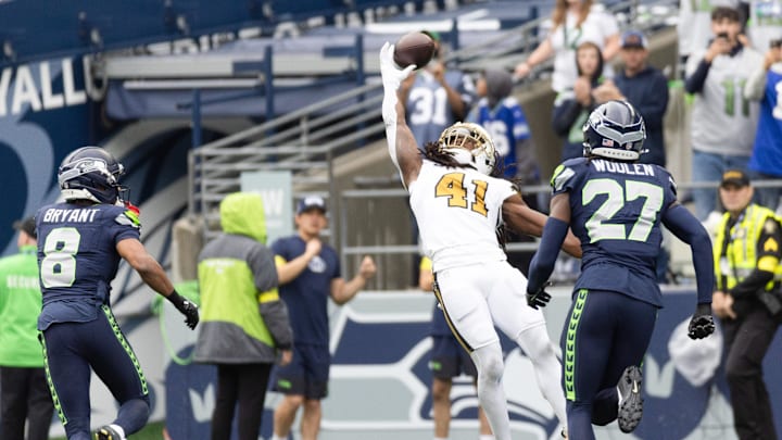 Sep 21, 2025; Seattle, Washington, USA; New Orleans Saints running back Alvin Kamara (41) misses a catch during the first quarter against the Seattle Seahawks at Lumen Field. Mandatory Credit: Joe Nicholson-Imagn Images