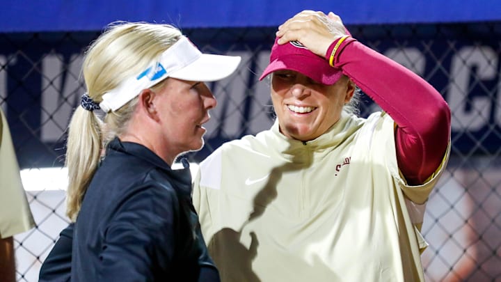 OU coach Patty Gasso and FSU coach Lonni Alameda talk after OU won the Women's College World Series finals between Oklahoma (OU) and Florida State at USA Softball Hall of Fame Stadium in Oklahoma City on Thursday, June 8, 2023.