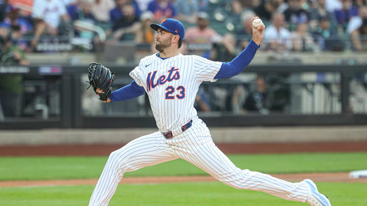 Jun 11, 2025; New York City, New York, USA; New York Mets starting pitcher David Peterson (23) delivers a pitch during the first inning against the Washington Nationals at Citi Field. 
