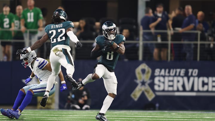 Nov 10, 2024; Arlington, Texas, USA; Philadelphia Eagles safety C.J. Gardner-Johnson (8) intercepts a pass against Dallas Cowboys wide receiver Jalen Tolbert (1) in the fourth quarter at AT&T Stadium. Mandatory Credit: Tim Heitman-Imagn Images