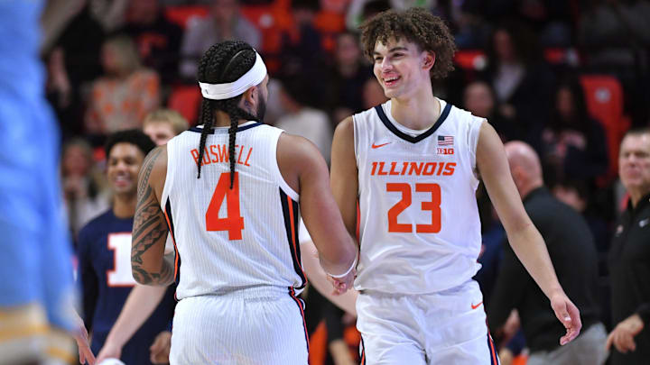 Dec 29, 2025; Champaign, Illinois, USA;  Illinois Fighting Illini guard Keaton Wagler (23) and teammate Kylan Boswell (4) react in the closing minutes of the second half against the Southern University Jaguars  at State Farm Center. Mandatory Credit: Ron Johnson-Imagn Images