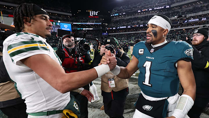 Green Bay Packers quarterback Jordan Love (10) and Philadelphia Eagles quarterback Jalen Hurts (1) after their playoff game.