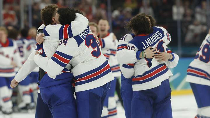 Feb 22, 2026; Milan, Italy; Team USA players celebrate after a golden goal in overtime by Jack Hughes #86 of Team United States during the Milano Cortina 2026 Olympic Winter Games at Milano Santagiulia Ice Hockey Arena. Mandatory Credit: Geoff Burke-Imagn Images Feb 22, 2026; Milan, Italy; Team USA players celebrate after a golden goal in overtime by Jack Hughes #86 of Team United States during the Milano Cortina 2026 Olympic Winter Games at Milano Santagiulia Ice Hockey Arena. Mandatory Credit: Geoff Burke-Imagn Images