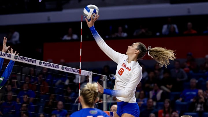 Florida Gators outside hitter Kennedy Martin (18) hits the ball during the first set against the FGCU Eagles in the first round of the NCAA Women's Volleyball Championship at Exactech Arena at the Stephen C. O'Connell Center in Gainesville, FL on Thursday, November 30, 2023.