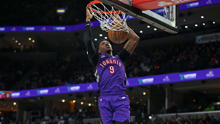 Dec 26, 2024; Memphis, Tennessee, USA; Toronto Raptors guard RJ Barrett (9) dunks during the third quarter against the Memphis Grizzlies at FedExForum. Mandatory Credit: Petre Thomas-Imagn Images