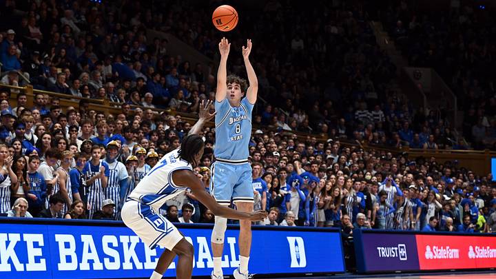 Nov 14, 2025; Durham, North Carolina, USA; Indiana State Sycamores guard Camp Wagner (8) shoots over Duke Blue Devils forward Dame Sarr (7) during the first half at Cameron Indoor Stadium. Nov 14, 2025; Durham, North Carolina, USA; Indiana State Sycamores guard Camp Wagner (8) shoots over Duke Blue Devils forward Dame Sarr (7) during the first half at Cameron Indoor Stadium.