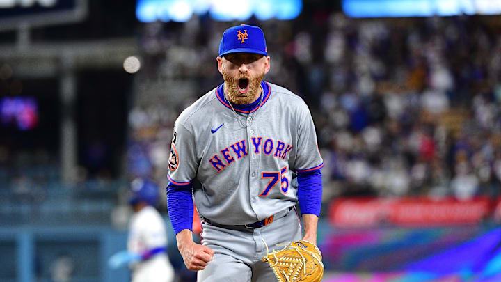 June 3, 2025; Los Angeles, California, USA; New York Mets pitcher Reed Garrett (75) reacts after striking out Los Angeles Dodgers catcher Will Smith (16) to end the eighth inning at Dodger Stadium. Mandatory Credit: Gary A. Vasquez-Imagn Images June 3, 2025; Los Angeles, California, USA; New York Mets pitcher Reed Garrett (75) reacts after striking out Los Angeles Dodgers catcher Will Smith (16) to end the eighth inning at Dodger Stadium. Mandatory Credit: Gary A. Vasquez-Imagn Images