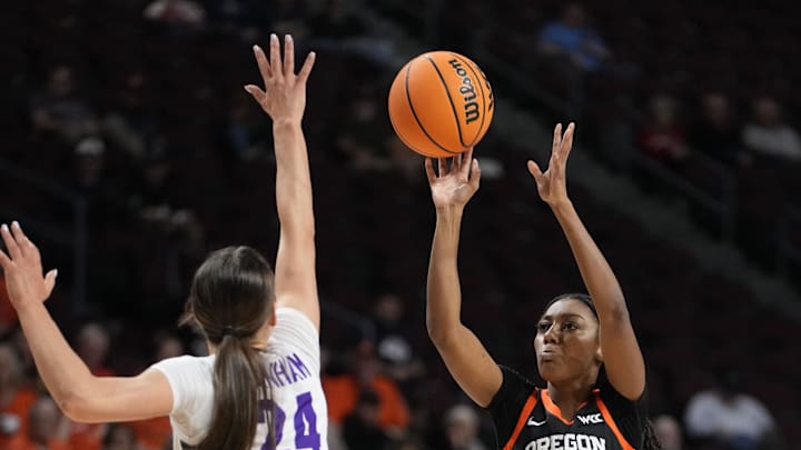 March 11, 2025; Las Vegas, NV, USA; Oregon State Beavers guard Tiara Bolden (0) shoots the basketball against Portland Pilots guard Maisie Burnham (24) during the first half in the final of the West Coast Conference tournament at Orleans Arena. Mandatory Credit: Kyle Terada-Imagn Images March 11, 2025; Las Vegas, NV, USA; Oregon State Beavers guard Tiara Bolden (0) shoots the basketball against Portland Pilots guard Maisie Burnham (24) during the first half in the final of the West Coast Conference tournament at Orleans Arena. Mandatory Credit: Kyle Terada-Imagn Images