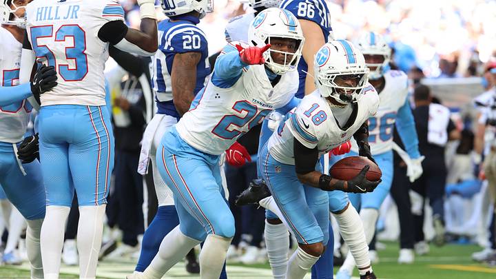 Oct 18, 2026; Indianapolis, Indiana, USA; Tennessee Titans cornerback Cor'Dale Flott (18) reacts after catching an interception against the Indianapolis Colts during the second half at Lucas Oil Stadium. Mandatory Credit: Trevor Ruszkowski-Imagn Images Oct 18, 2026; Indianapolis, Indiana, USA; Tennessee Titans cornerback Cor'Dale Flott (18) reacts after catching an interception against the Indianapolis Colts during the second half at Lucas Oil Stadium. Mandatory Credit: Trevor Ruszkowski-Imagn Images