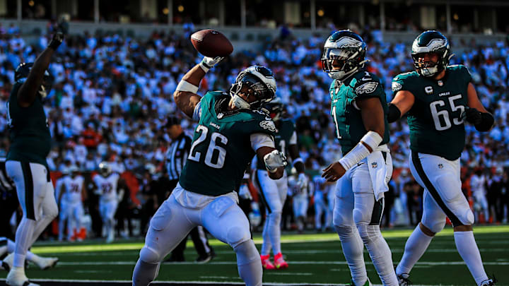 Oct 27, 2024; Cincinnati, Ohio, USA; Philadelphia Eagles running back Saquon Barkley (26) reacts after quarterback Jalen Hurts (1) scores a touchdown against the Cincinnati Bengals in the second half at Paycor Stadium. Mandatory Credit: Katie Stratman-Imagn Images