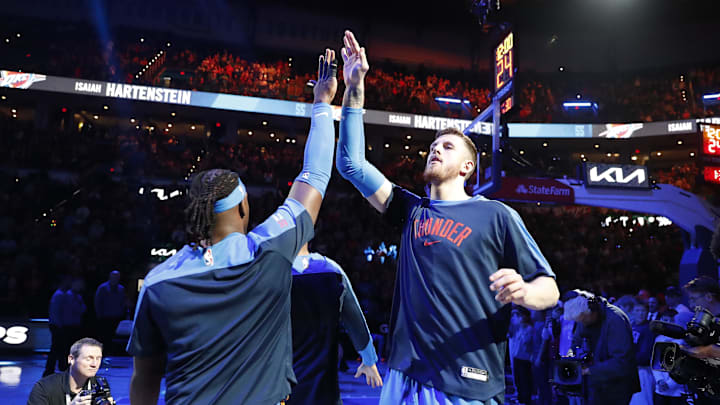 Dec 31, 2024; Oklahoma City, Oklahoma, USA; Oklahoma City Thunder center Isaiah Hartenstein (55) during introductions before a game against the Minnesota Timberwolves at Paycom Center. Mandatory Credit: Alonzo Adams-Imagn Images Dec 31, 2024; Oklahoma City, Oklahoma, USA; Oklahoma City Thunder center Isaiah Hartenstein (55) during introductions before a game against the Minnesota Timberwolves at Paycom Center. Mandatory Credit: Alonzo Adams-Imagn Images