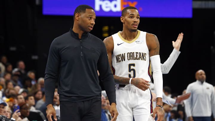 Nov 29, 2024; Memphis, Tennessee, USA; New Orleans Pelicans head coach Willie Green talks with guard Dejounte Murray (5) during the third quarter against the Memphis Grizzlies at FedExForum. Mandatory Credit: Petre Thomas-Imagn Images