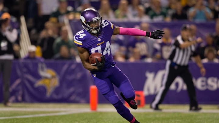 Oct 27, 2013; Minneapolis, MN, USA; Minnesota Vikings wide receiver Cordarrelle Patterson (84) returns a kickoff against the Green Bay Packers in the first quarter at Mall of America Field at H.H.H. Metrodome. The Packers win 44-31. Mandatory Credit: Bruce Kluckhohn-Imagn Images