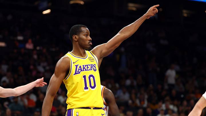 Oct 14, 2025; Phoenix, Arizona, USA; Los Angeles Lakers center Christian Koloko (10) against the Phoenix Suns during an NBA preseason game at Mortgage Matchup Center. Mandatory Credit: Mark J. Rebilas-Imagn Images