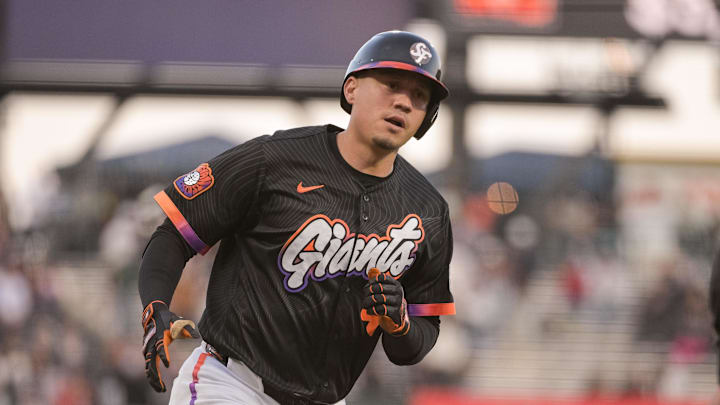 Aug 26, 2025; San Francisco, California, USA;  San Francisco Giants first baseman Wilmer Flores (41) rounds the bases after hitting a home run against the Chicago Cubs during the second inning at Oracle Park. Mandatory Credit: Ed Szczepanski-Imagn Images