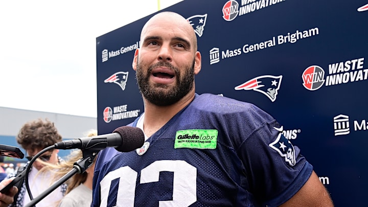 Jul 27, 2023; Foxborough, MA, USA; New England Patriots defensive end Lawrence Guy (93) speaks to the media after training camp at Gillette Stadium. Mandatory Credit: Eric Canha-Imagn Images
