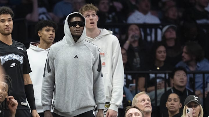 Oct 26, 2025; Minneapolis, Minnesota, USA; Minnesota Timberwolves guard Anthony Edwards (5) stands from the bench after injuring his hamstring in the first half against the Indiana Pacers in the at Target Center. Mandatory Credit: Jesse Johnson-Imagn Images