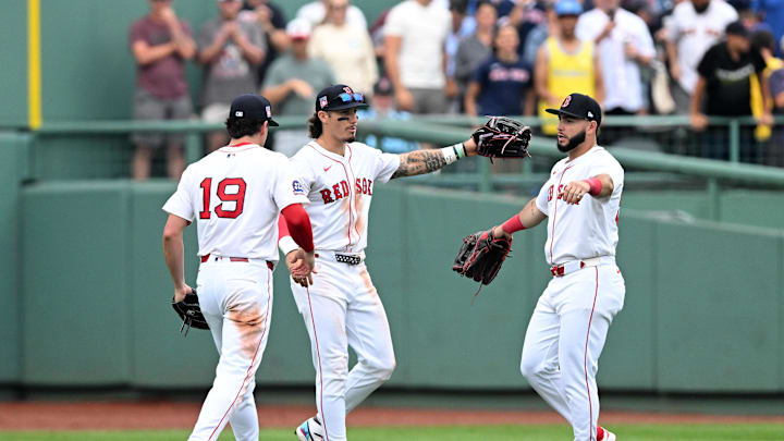 Jul 27, 2025; Boston, Massachusetts, USA; Boston Red Sox right fielder Roman Anthony (19) celebrates with left fielder Jarren Duran (16) and outfielder Wilyer Abreu (52) celebrate after a game against the Los Angeles Dodgers at Fenway Park. Mandatory Credit: Brian Fluharty-Imagn Images