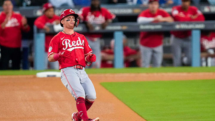Cincinnati Reds second baseman Matt McLain (9) stands up into a double in the third inning of the MLB National League Wild Card Game 1 between the Los Angeles Dodgers and the Cincinnati Reds at Dodger Stadium in Los Angeles on Tuesday, Sept. 30, 2025. The Dodgers won game 1 of the series, 10-5.