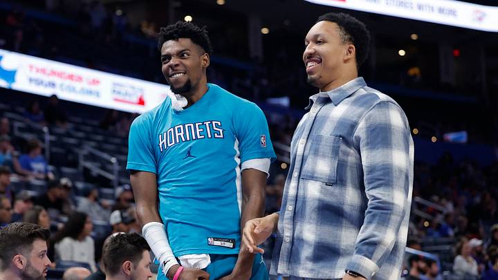 Charlotte Hornets forward Brandon Miller (24) and Charlotte Hornets forward Grant Williams (2) celebrate in the final seconds Charlotte Hornets forward Brandon Miller (24) and Charlotte Hornets forward Grant Williams (2) celebrate in the final seconds