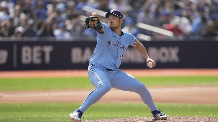 Jun 1, 2024; Toronto, Ontario, CAN; Toronto Blue Jays starting pitcher Yusei Kikuchi (16) throws against the Pittsburgh Pirates during the fourth inning at Rogers Centre. Mandatory Credit: John E. Sokolowski-USA TODAY Sports