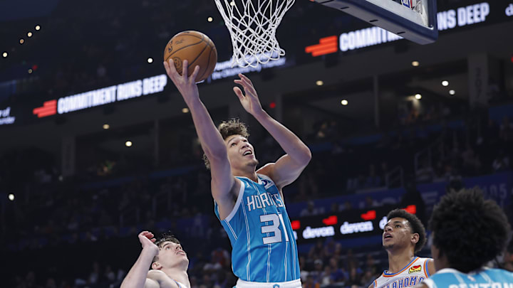 Oct 9, 2025; Oklahoma City, Oklahoma, USA; Charlotte Hornets forward Tidjane Salaün (31) shoots against the Oklahoma City Thunder during the second half of a game between the Charlotte Hornets and the Oklahoma City Thunder at Paycom Center. Mandatory Credit: Alonzo Adams-Imagn Images