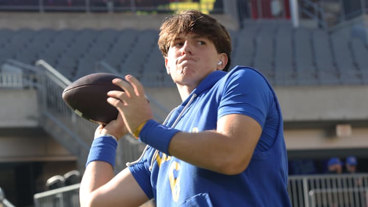 Oct 4, 2025; Pittsburgh, Pennsylvania, USA; Pittsburgh Panthers quarterback Mason Heintschel (6) warms up before the game against the Boston College Eagles at Acrisure Stadium. Mandatory Credit: Charles LeClaire-Imagn Images