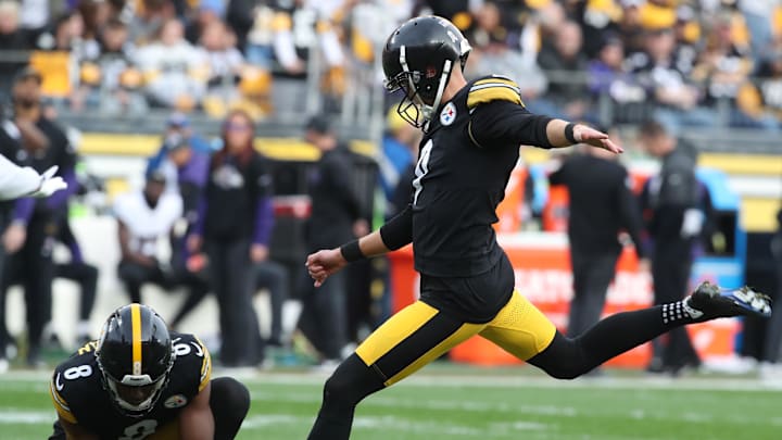 Nov 17, 2024; Pittsburgh, Pennsylvania, USA;  Pittsburgh Steelers place kicker Chris Boswell (9) kicks a field goal from the hold of punter Corliss Waitman (8) against the Baltimore Ravens during the third quarter at Acrisure Stadium. Mandatory Credit: Charles LeClaire-Imagn Images