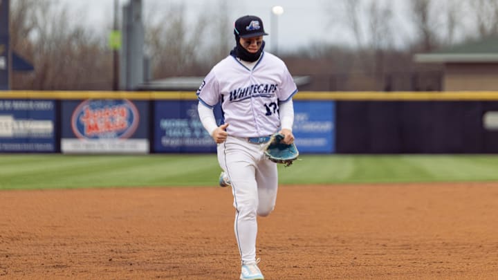 Whitecaps center fielder Max Clark runs toward the dugout on Friday, April, 4, at LMCU Ballpark.