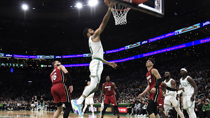 Apr 21, 2024; Boston, Massachusetts, USA; Boston Celtics forward Jayson Tatum (0) lays the ball in vs. the Miami Heat. Apr 21, 2024; Boston, Massachusetts, USA; Boston Celtics forward Jayson Tatum (0) lays the ball in vs. the Miami Heat.